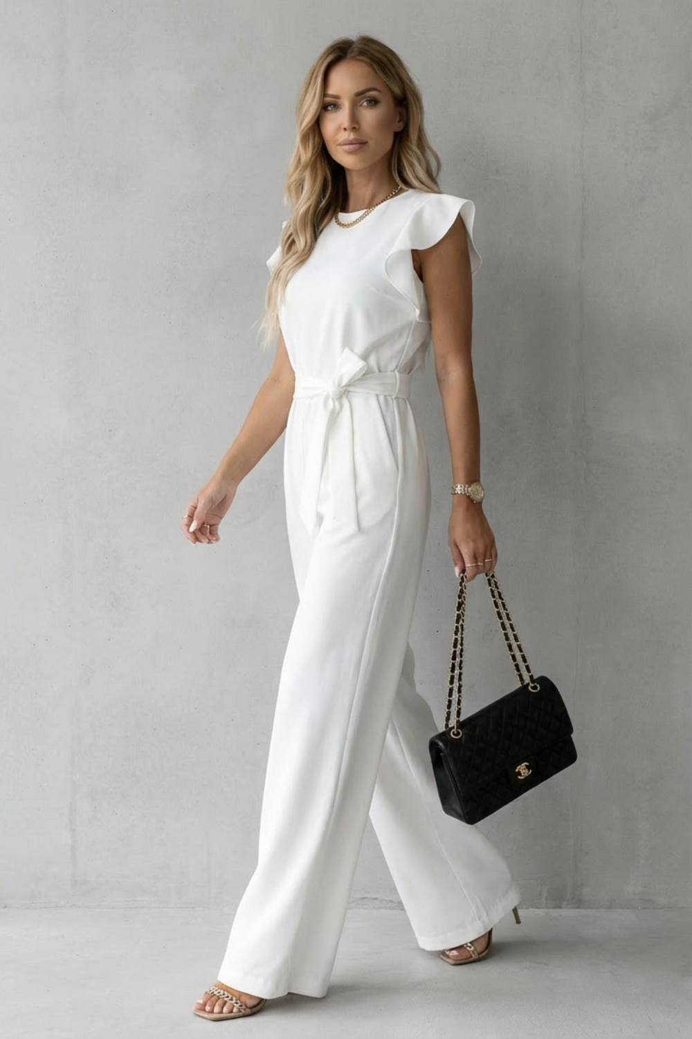 Virelle – Ruffle sleeve belted – Wide-leg jumpsuit